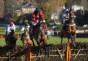Dashing Oscar ridden by Noel Fehily leads the field over an early flight before going on to win The Barry Rawlings 'What A Year' Novices' Hurdle Race run during day two of the Tingle Creek Christmas Festival at Sandown Park Racecourse. PRESS A