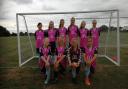 NEW KIT: Jurassic Coast Girls under-12s in their kit sponsored by McDonalds drive through Weymouth