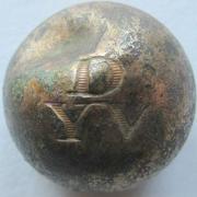 The ball shaped button with DYV enscribed on it