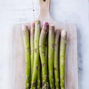 Asparagus on a chopping board