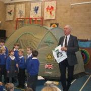 Mr Wrigley, from the Dorchester Rotary Club, leading the assembly at Milborne St Andrew First School.