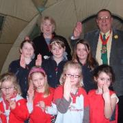 Some of the Brownies and Rainbows in the Shelterbox tent.