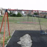 Ripped up safety surfaces make the Marsh play area unsafe and costly to maintain