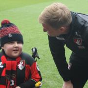 Adam, a big Bournemouth fan, alongside Eddie Howe. Picture: The Dorset Children's Foundation