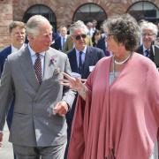 Prince Charles visits Weymouth College Stone Masonry Carving students at Middle Farm Way in Poundbury.  Prince Charles with Sarah Drew director of Dorset Centre for the Creative Arts.   25th May 2018.  Picture Credit: Graham Hunt Photography.