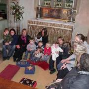 Tots and grownups celebrate with Revd Debbie Smith at All Saints, Wyke