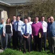 Radipole rector, Rev Ian Hobbs and church warden, Dave Turnbull with the contractors and design team outside the hall that is to be replaced.