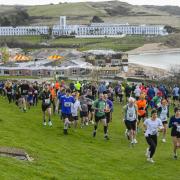 Runners negotiate the Bowleaze loop in last year's Weymouth Bay 10k