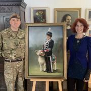 Delight as local artist donates painting of Ram Major to Bovington army base