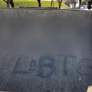 Homophobic message graffitied on skate park with offensive word blurred out