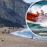 Walkers were stranded on the beach after a rockfall at Charmouth