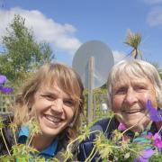 Becky Groves and Monique Pasche from Bridport Gardening Club with some of the plants being used in the planters