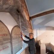 Margaret Horton pulls on the sally to ring the bell for the Sunday service