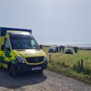 Woman rescued after falling from coastal path