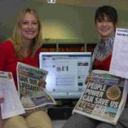 SOS: Echo reporters Joanna Davis and Catherine Bolado with the petition and campaigning papers