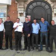 Dave Heap, Stuart Bird, Rob Chick, Lee Sketchley, Andi Kiley, John Wales and Steve Drinkwater at the coastguard centre on Weymouth quayside