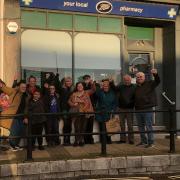 Mayor Carralyn Parkes with residents outside the Boots in Fortuneswell to show their support for keeping the pharmacy open