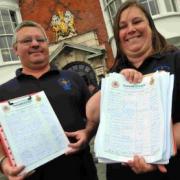 SAVE OUR SEA HEROES: Mark Bowditch and Stella Roper with the coastguard centre petition