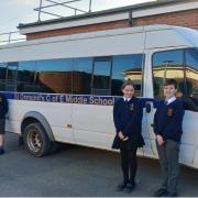 Four pupils from Year 6 acted as library helpers