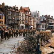 US troops marching along Weymouth Esplanade
