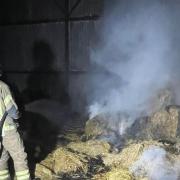 Firefighters tackled the fire inside the barn