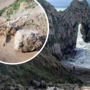 Boulders fall onto coast path at Durdle Door