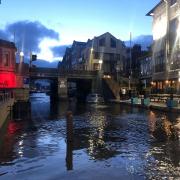 High tides flooding Commercial Road outside The Anchor in Weymouth