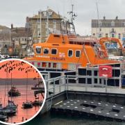 A boat crew was rescued after their engine failed