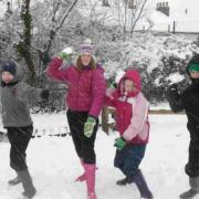 Pupils from Greenford primary school enjoying the snow