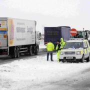 WINTER ALERT: Police on the A35 near the Litton Cheney junction