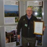 John with his certificate