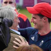 WELL DONE, SON: Peter Wilson celebrates with dad Charles