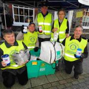 BE GENEROUS: Dorchester Rotary Club members John Adams, Rowland Cornell, Don Ireland, Pat Bailey and Les Fry collecting in South Street