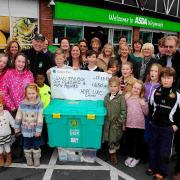 THANKS: Hope URC members present the cheque to Ian Brooke for the Shelterbox appeal at Asda