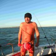IT'S A BIT NIPPY: Mark Hilliard at sea in his lobster thong