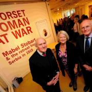 Captain Michael Fulford-Dobson, Kate Adie and Dr Peter Down at the entrance to the exhibition