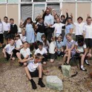 SCHOOL’S OUT: Broadmayne First School leavers class including Hebe Taylor and teacher Simon Oxley