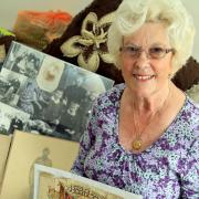 Pat Bryant with some of the records, photographs and memorabilia about her great-uncles and grandfather collection over many years