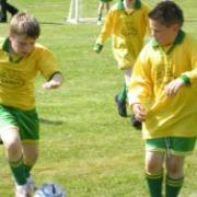 cub footballers in action
