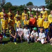 N The Mini-kickers, under-8s and under-14s all enjoyed the occasion