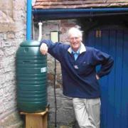 AWARD WINNING: David Kemp poses with The Purbeck Information and Heritage Centre’s water butt