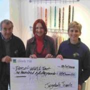 CASH TO HELP WILDLIFE: From left, Dorset Wildlife Trust’s Giles Harbottle, Andrea Frankham-Hughes of Jezebel’s Jewels and the trust’s Nicky Hoar