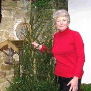 Sue Farrant with a Christmas tree