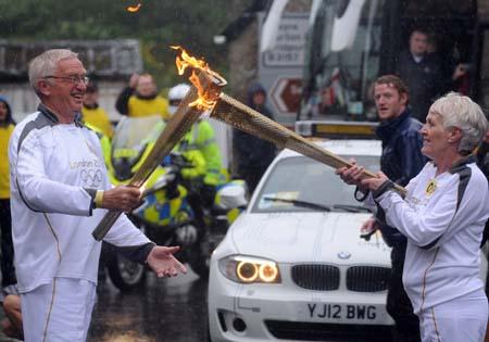 Olympic Torch in Abbotsbury. Picture: Finnbarr Webster.