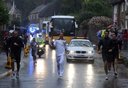 Olympic Torch Relay in Abbotsbury. Picture: Finnbarr Webster.