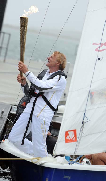 Olympic Torch at Weymouth Sailing Academy. Picture: Finnbarr Webster.
