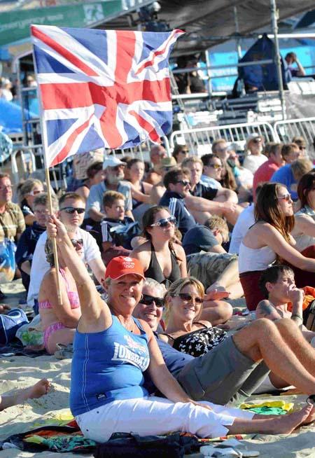 All our images from the Olympics: Friday, opening ceremony day, including Battle of the Winds and the taster sport events on Weymouth beach