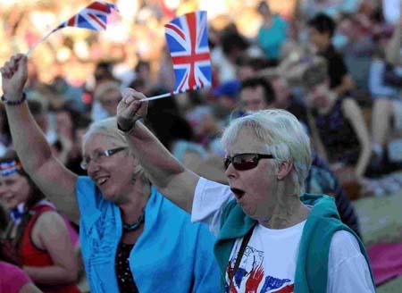 All our images from the Olympics: Friday, opening ceremony day, including Battle of the Winds and the taster sport events on Weymouth beach