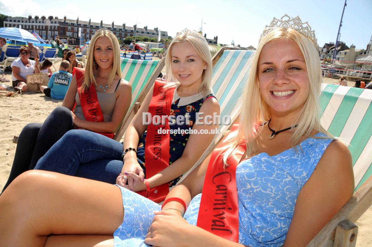Carnival Queen Gina Hartley on the beach with attendants Victoria Hope and Sarah Flann on the beach