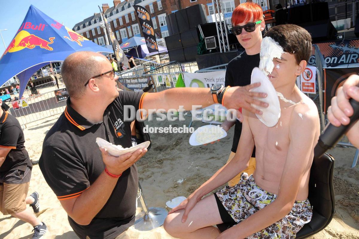 AIR 107.2 roadshow with Carl Greenham splatting quiz contestant Matthew Hoare with a custard pie after he got a question wrong